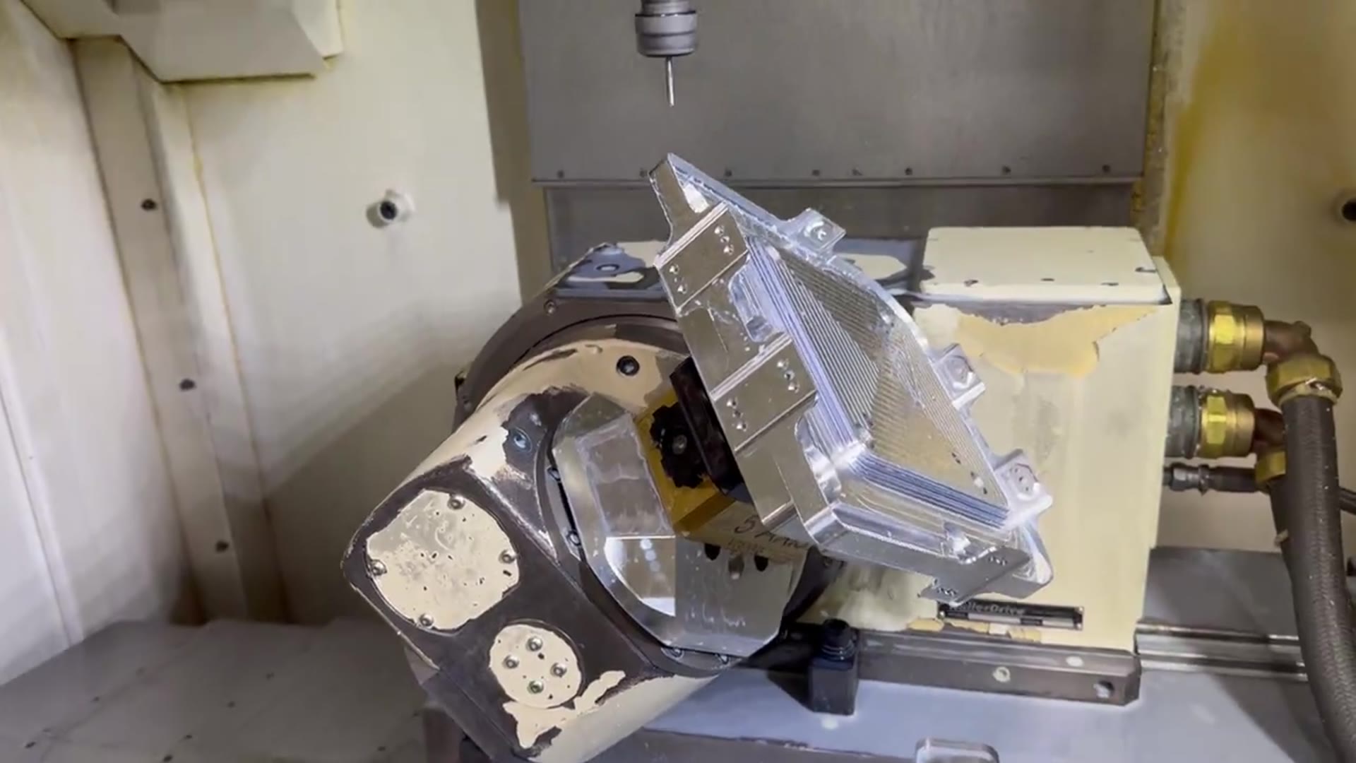 5-axis trunnion machining a complex aluminum component at Rigid Concepts