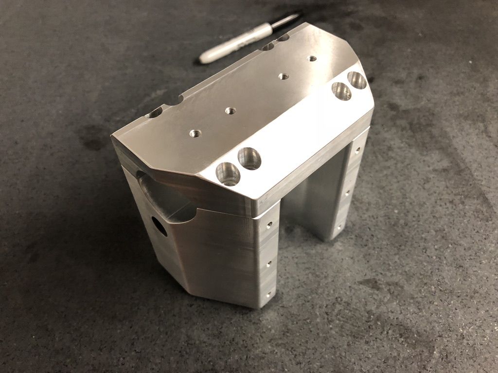 Precision CNC machined aluminum bracket by Rigid Concepts